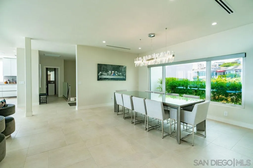 1001 La Jolla Rancho Road La Jolla, CA 92037 - Photo 26 of 47 a view of a big room with lounge chair and windows