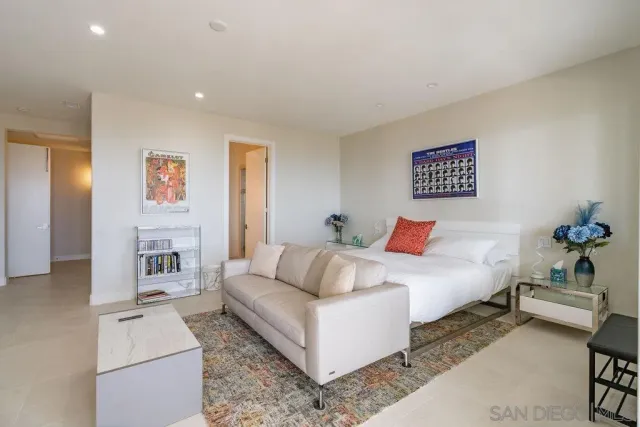 a bed room with a bed and a couch