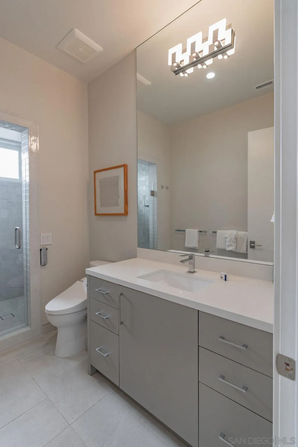 1001 La Jolla Rancho Road La Jolla, CA 92037 - Photo 31 of 47 a bathroom with a double vanity sink mirror and toilet