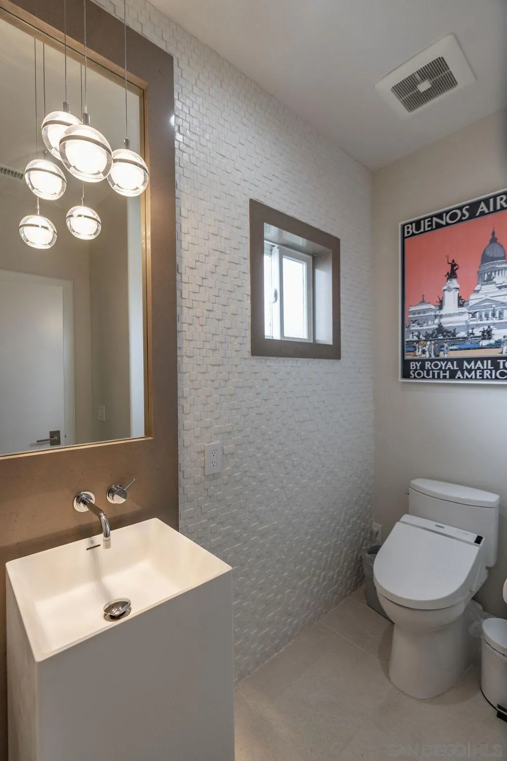 1001 La Jolla Rancho Road La Jolla, CA 92037 - Photo 43 of 47 a bathroom with a toilet sink and mirror
