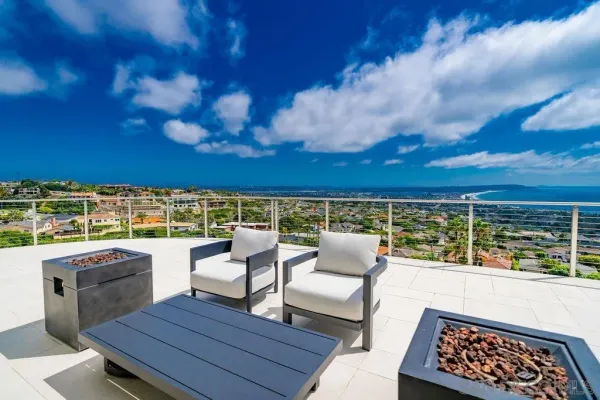 a view of roof deck with seating space