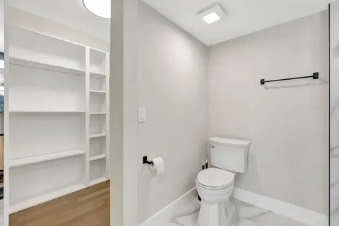 a view of an empty walk in closet