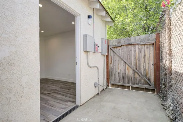 a view of a house with a backyard and stairs