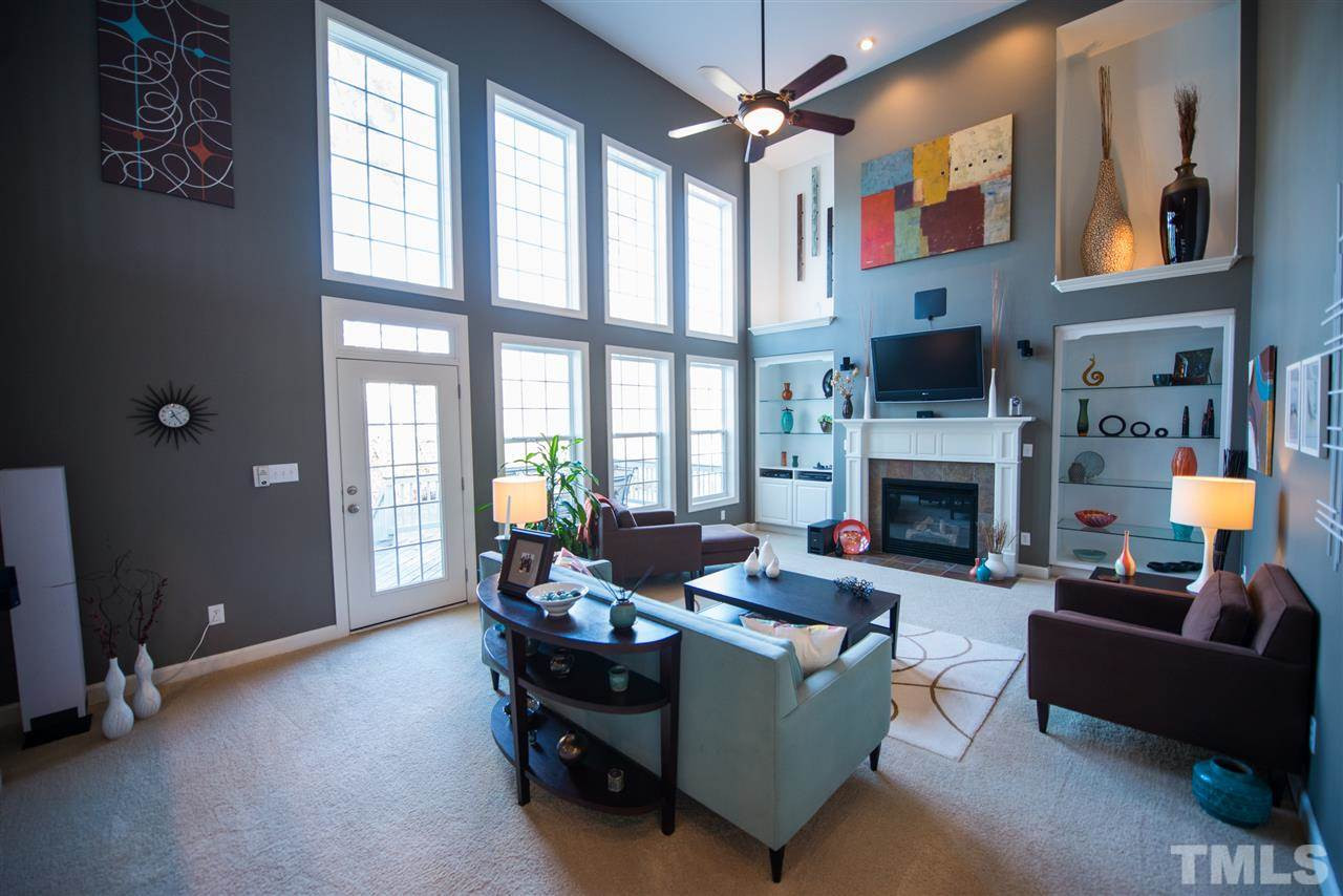 2417 Hagney Street Raleigh, NC 27614 - Photo 12 of 25 Two-story den with grand windows and custom built-ins Den/Family/Great Room