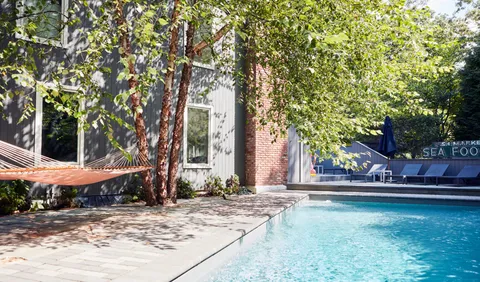 a backyard of a house with lots of green space