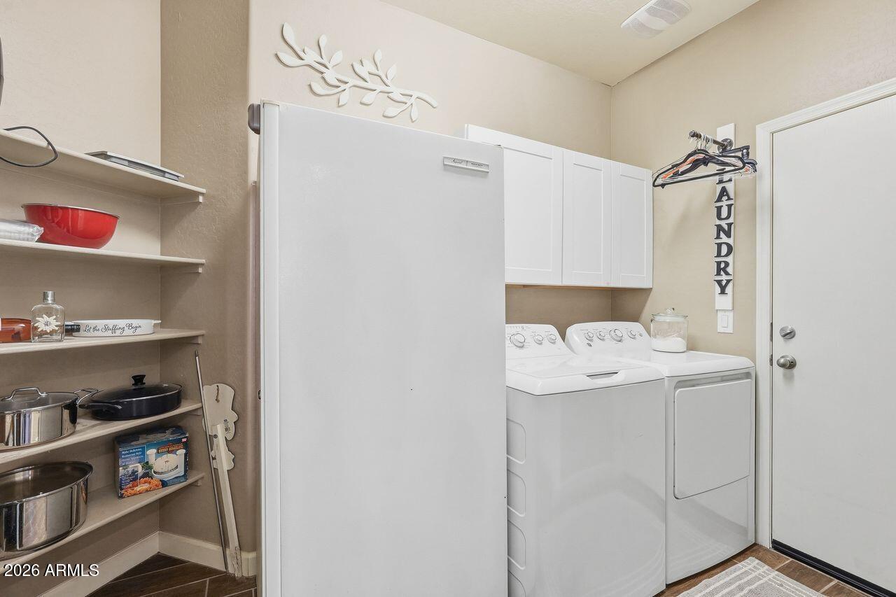 23602 West Ripple Road Buckeye, AZ 85326 - Photo 33 of 38 a utility room with washer and dryer