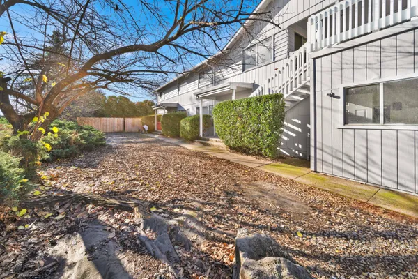 a view of a backyard of a house