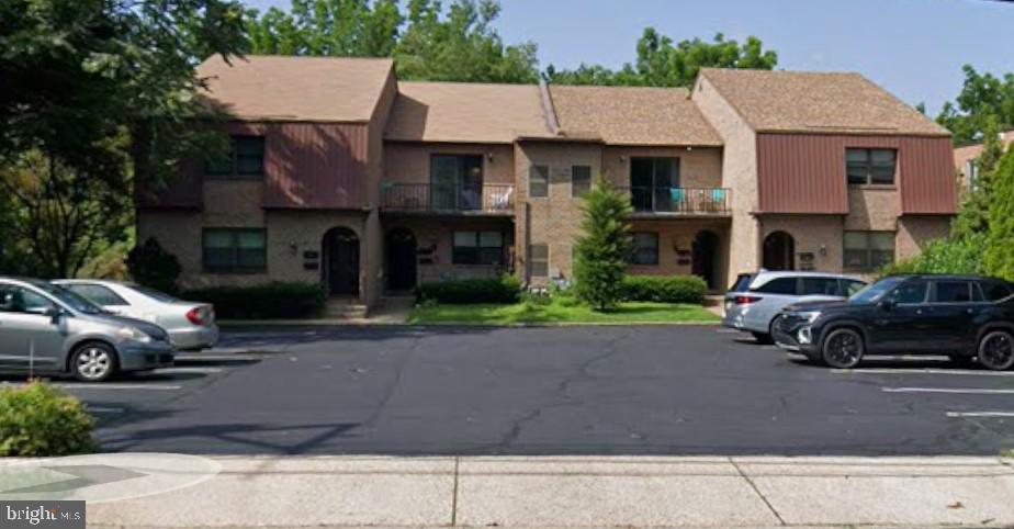 a car parked in front of a house