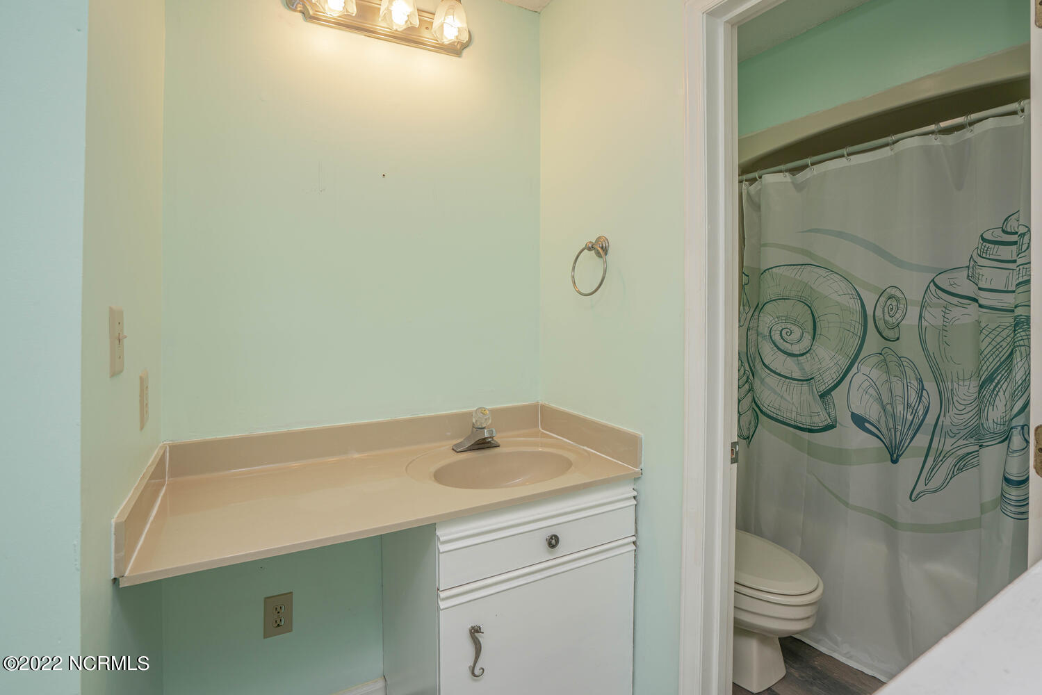 806 Colony Place, Unit F Sunset Beach, NC 28468 - Photo 13 of 54 Lockout Bathroom