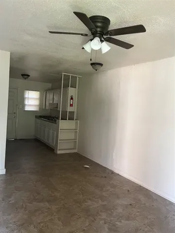 en empty room with windows