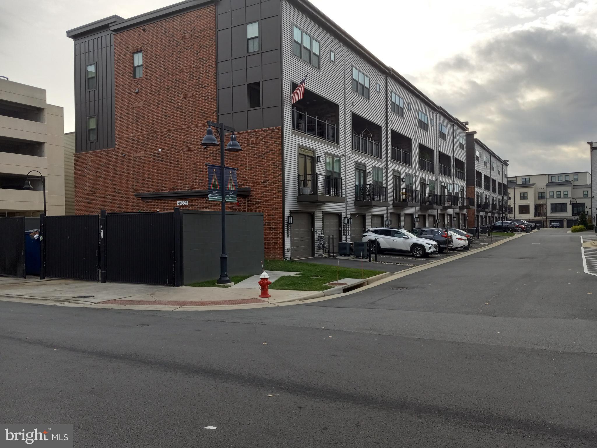 44682 Provincetown Drive Ashburn, VA 20147 - Photo 2 of 13 a view of a street with buildings