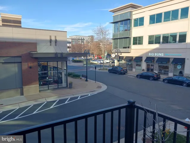 a view of a building with a street