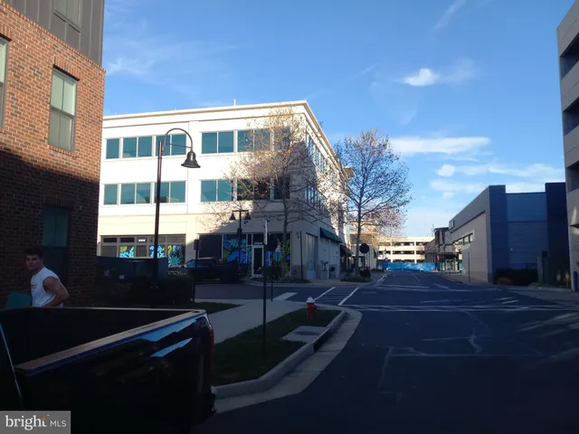 a view of a balcony with sitting area