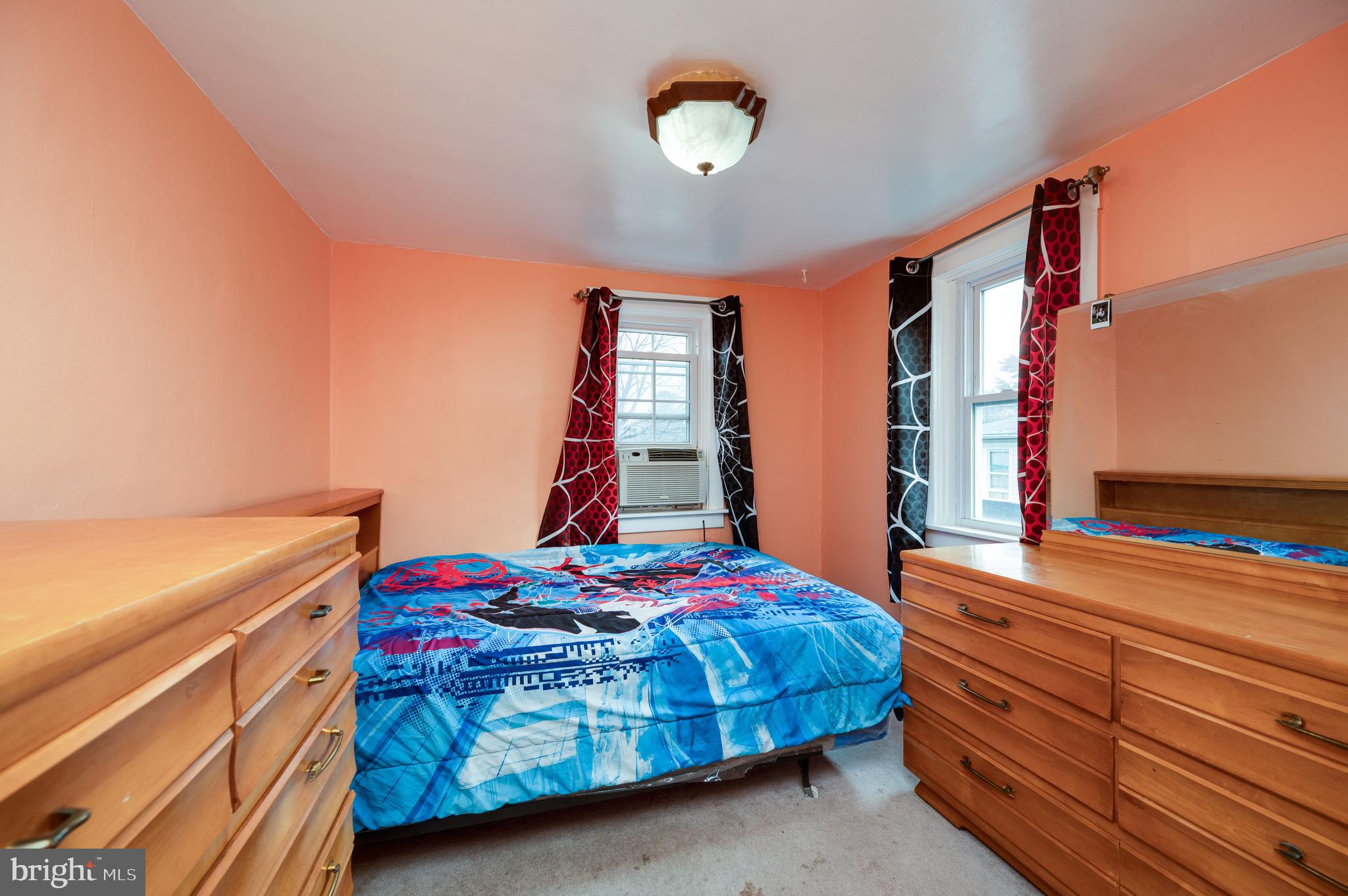 1108 Liberty Avenue Reading, PA 19607 - Photo 16 of 24 a bedroom with a bed and window