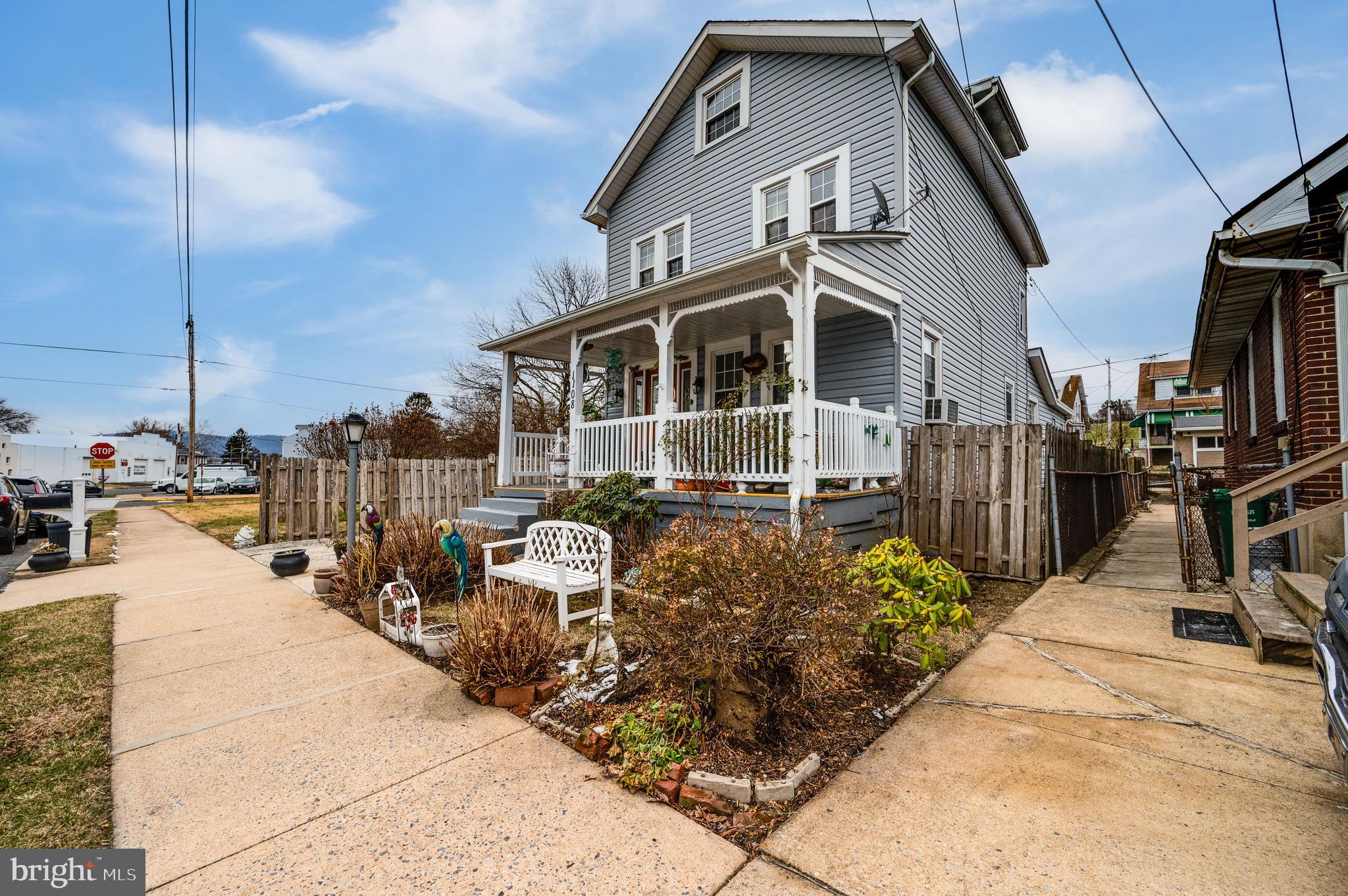 1108 Liberty Avenue Reading, PA 19607 - Photo 24 of 24 a front view of a house with a garden