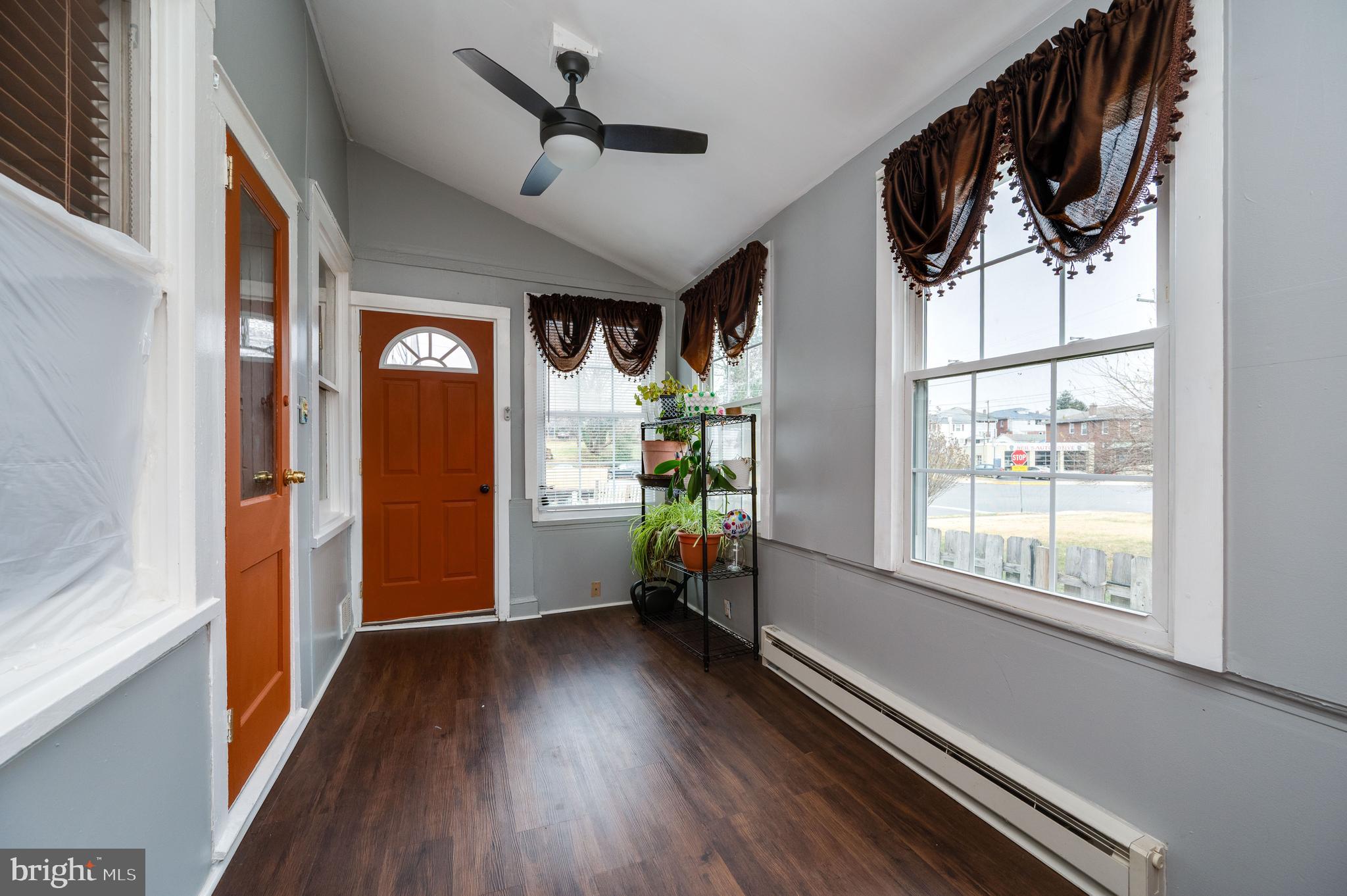 1108 Liberty Avenue Reading, PA 19607 - Photo 8 of 24 a view of hallway with wooden floor and windows