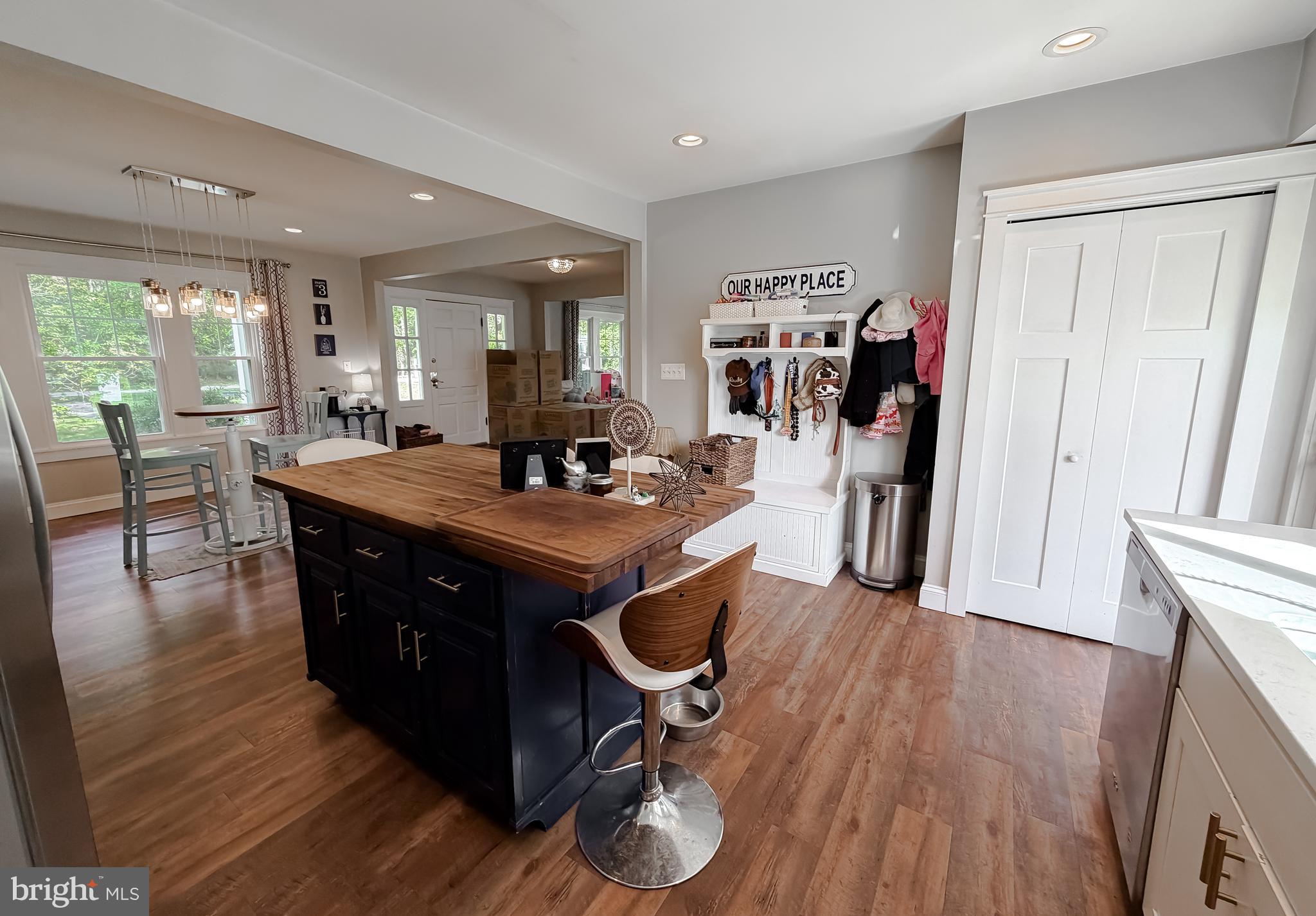 16146 Thomas Road Piney Point, MD 20674 - Photo 5 of 57 a view of a dining room with furniture window and wooden floor