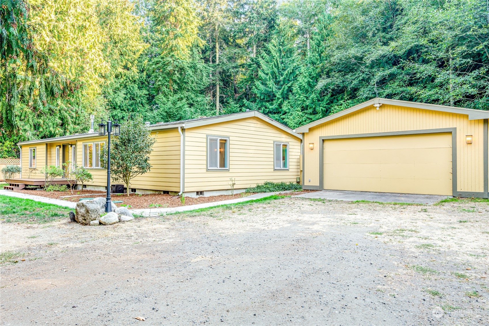 142 Ash Loop Port Townsend, WA 98368 - Photo 1 of 29 a view of backyard of house