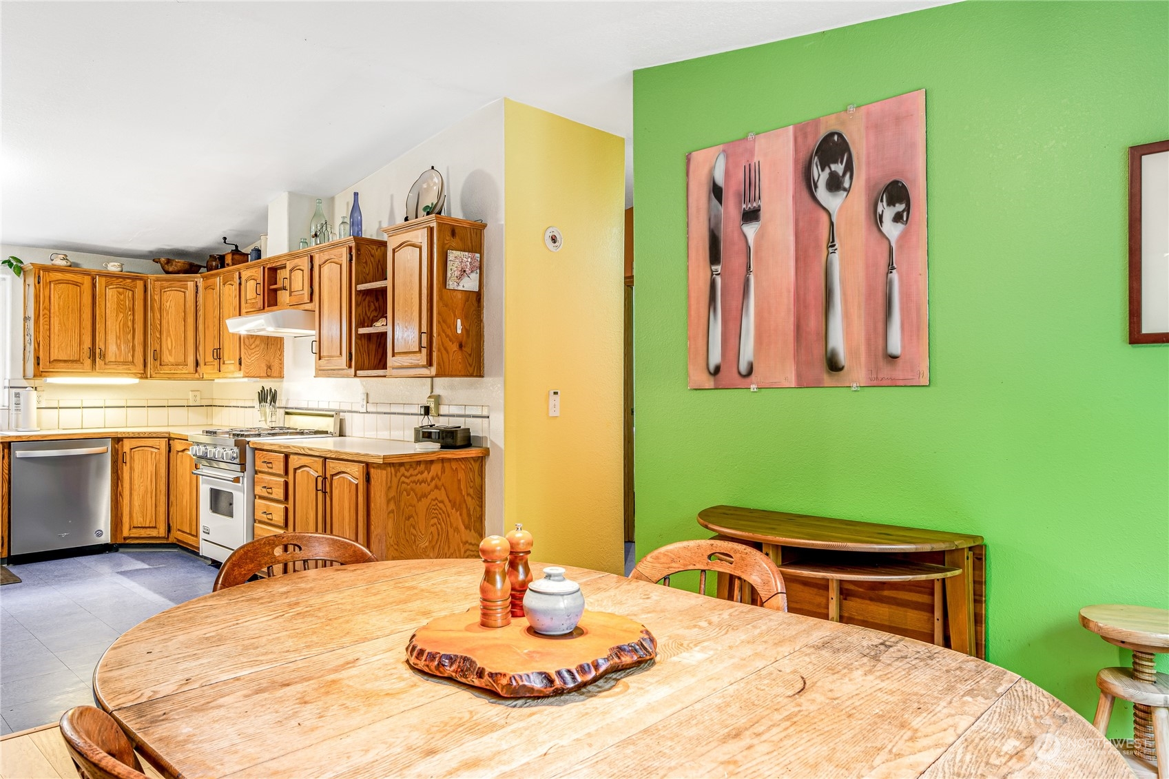 142 Ash Loop Port Townsend, WA 98368 - Photo 12 of 29 a kitchen with a table and chairs