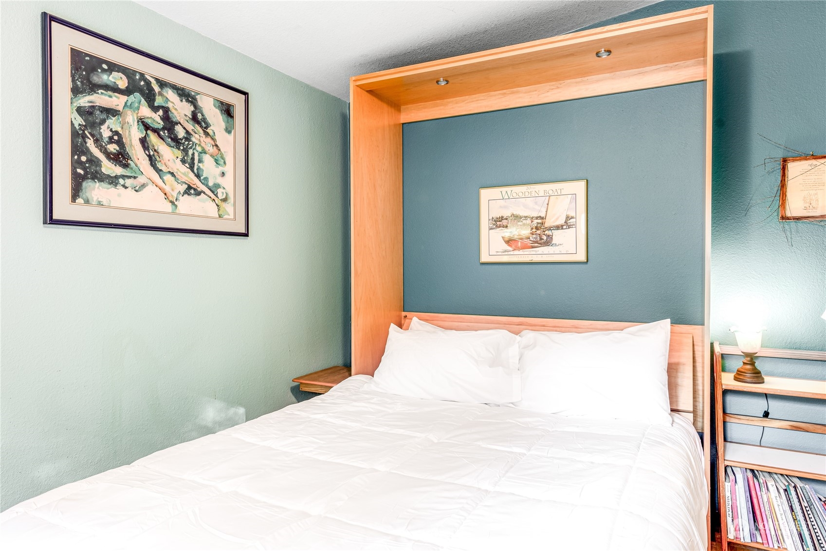 142 Ash Loop Port Townsend, WA 98368 - Photo 21 of 29 a bedroom with a bed and a painting on the wall