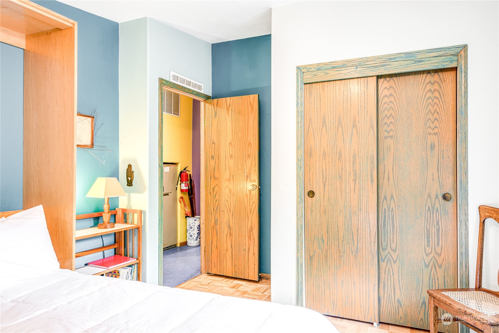 142 Ash Loop Port Townsend, WA 98368 - Photo 22 of 29 a view of a bedroom with wooden floor and windows