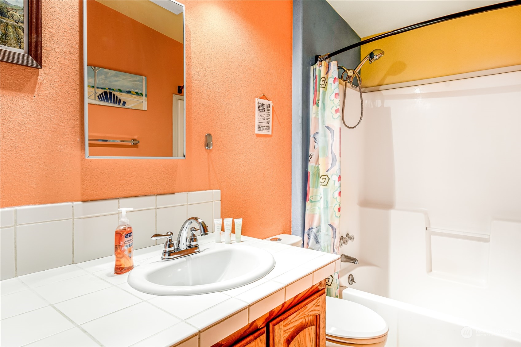 142 Ash Loop Port Townsend, WA 98368 - Photo 23 of 29 a bathroom with a sink a toilet and shower