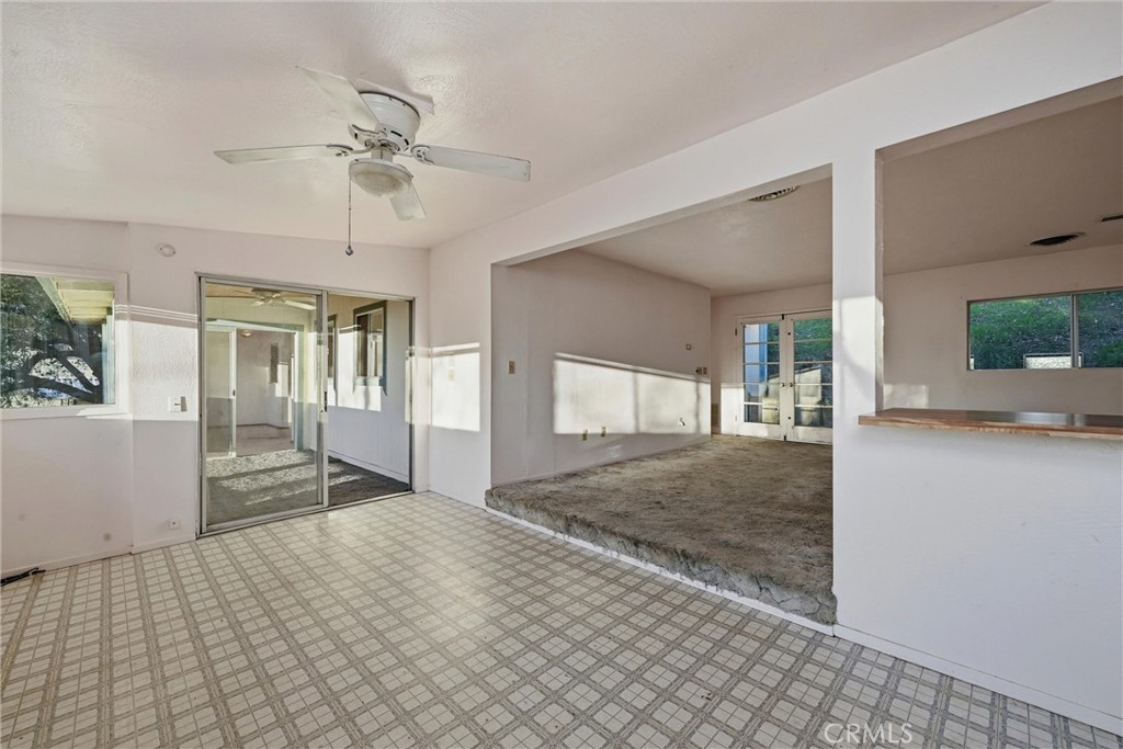 3398 Ogden Road Lucerne, CA 95458 - Photo 11 of 39 a view of a hallway view with wooden floor and staircase