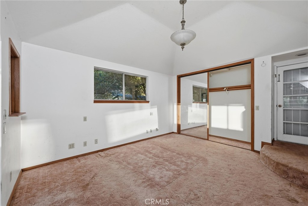 3398 Ogden Road Lucerne, CA 95458 - Photo 17 of 39 a view of an empty room with a window