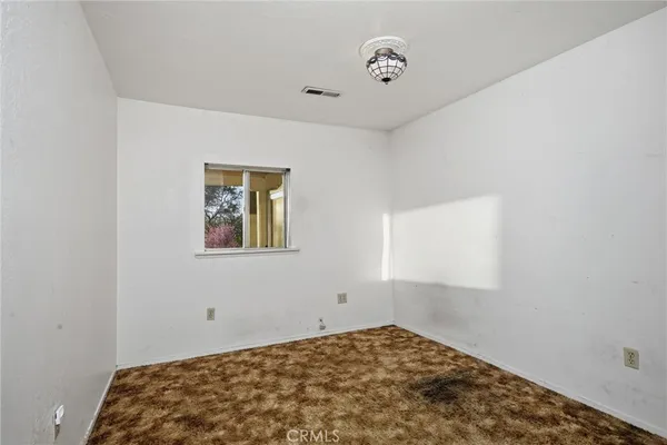a bathroom with a sink toilet and vanity