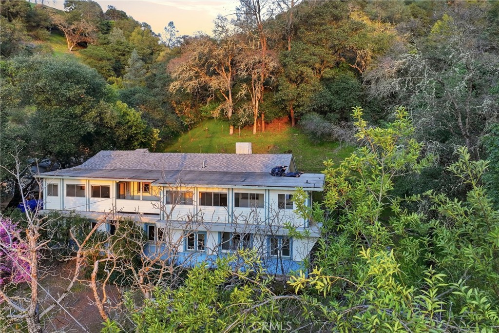 3398 Ogden Road Lucerne, CA 95458 - Photo 24 of 39 an aerial view of a house with swimming pool and garden