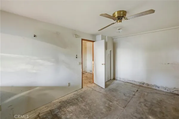 en empty room with windows