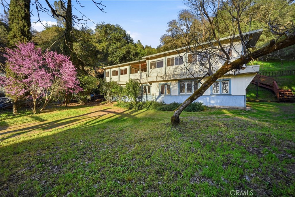 3398 Ogden Road Lucerne, CA 95458 - Photo 36 of 39 a view of a house with a yard