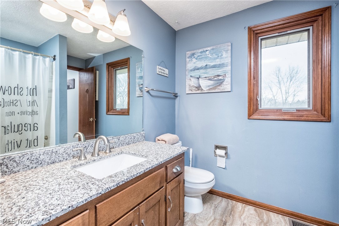 1762 Killian Road Akron, OH 44312 - Photo 11 of 20 Second floor main bath attaches to Master bed and has tub shower/combo