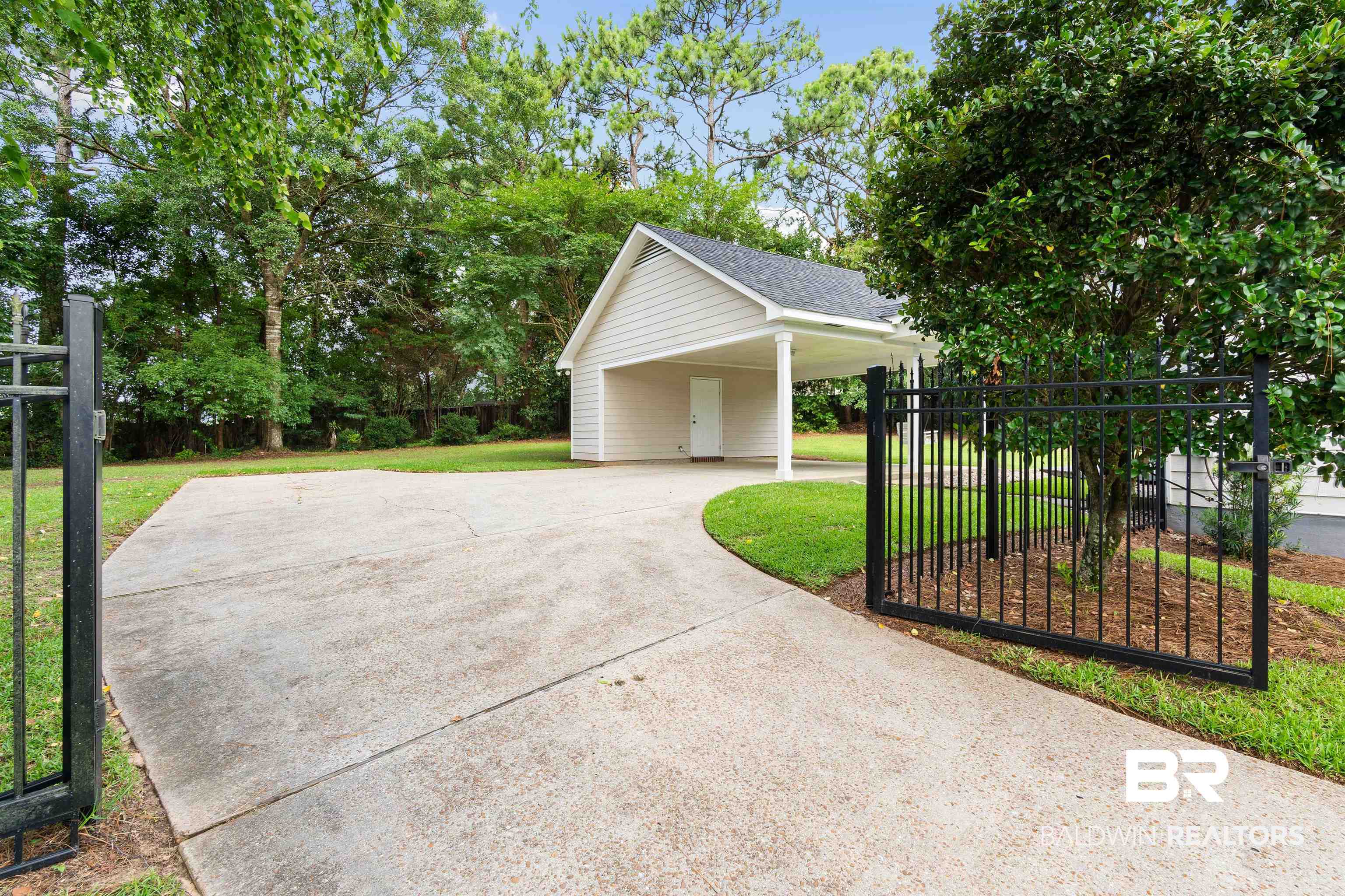 6457 Double Tree Court Mobile, AL 36695 - Photo 36 of 37 Exterior space with a front yard and a carport