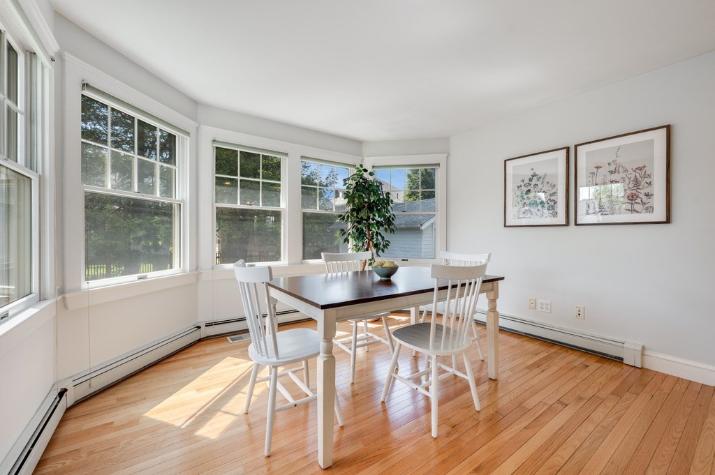 23 Pinewood Road Needham, MA 02492 - Photo 13 of 31 a view of a dining room with furniture window and wooden floor