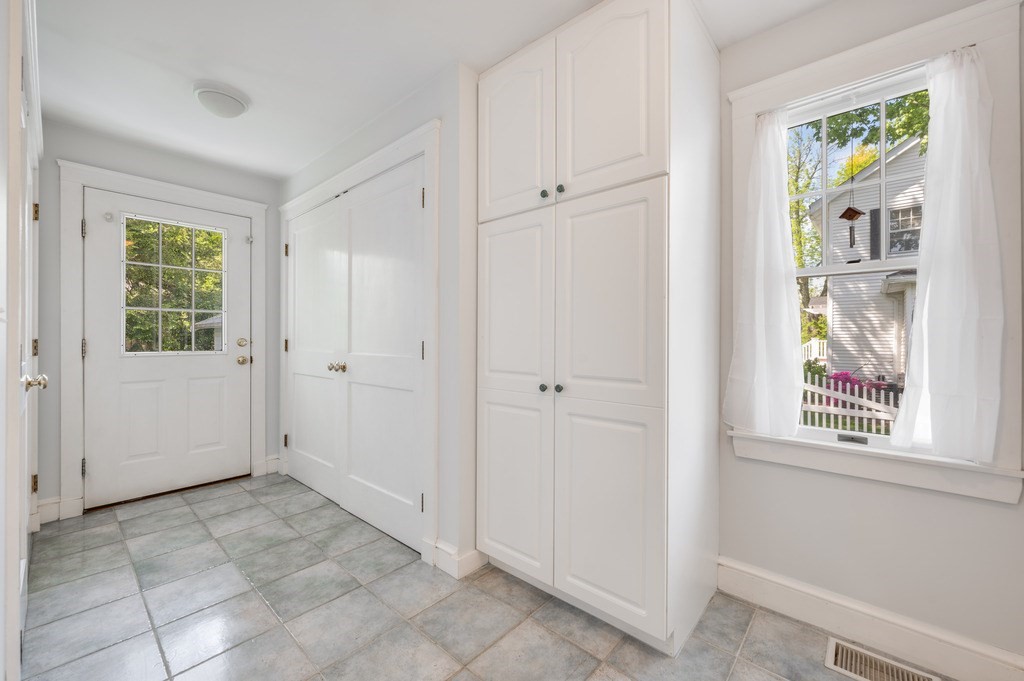 23 Pinewood Road Needham, MA 02492 - Photo 14 of 31 a view of an empty room with a window