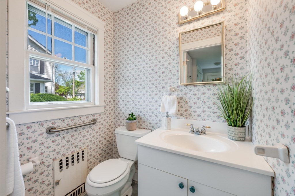 23 Pinewood Road Needham, MA 02492 - Photo 15 of 31 a bathroom with a sink a toilet and shower