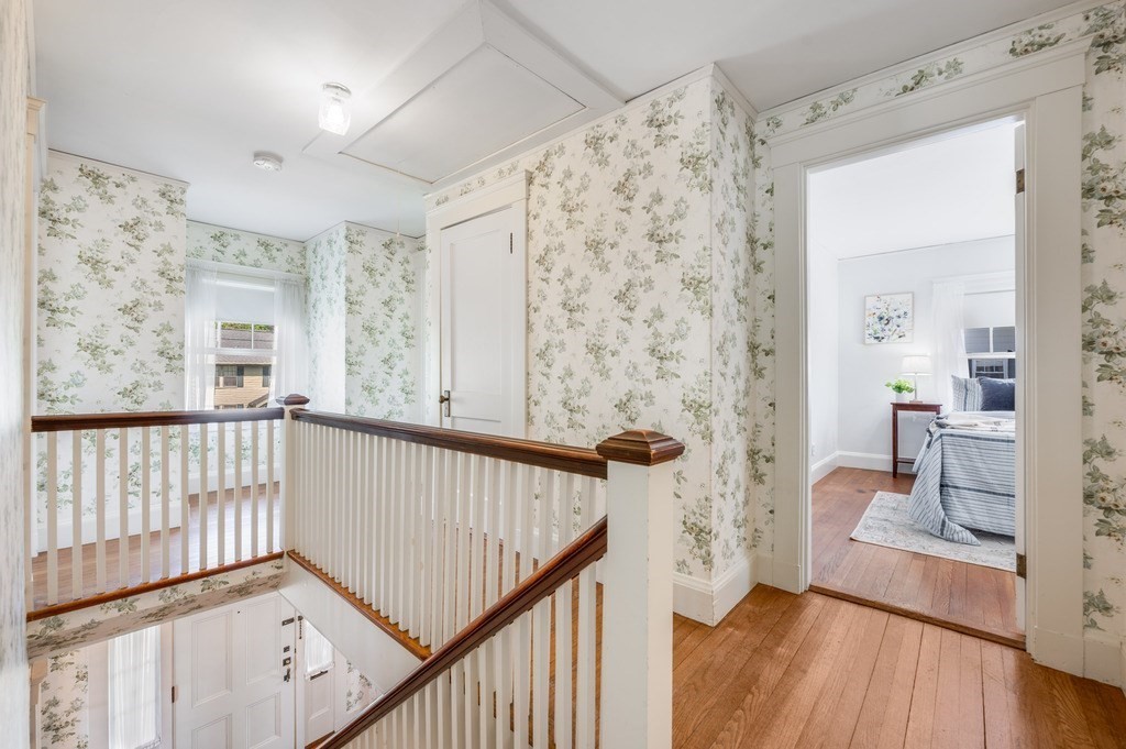 23 Pinewood Road Needham, MA 02492 - Photo 17 of 31 a view of a hallway with wooden floor and entryway