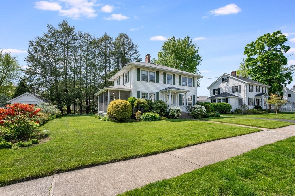 23 Pinewood Road Needham, MA 02492 - Photo 30 of 31 a front view of a house with a yard