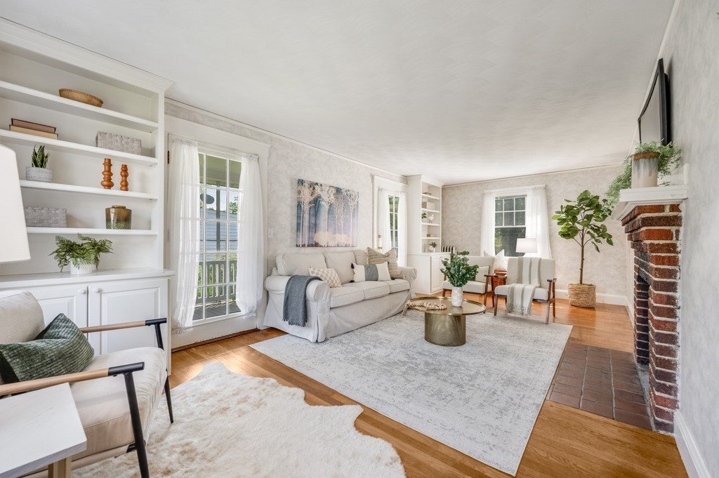 23 Pinewood Road Needham, MA 02492 - Photo 6 of 31 a living room with furniture and a dining table
