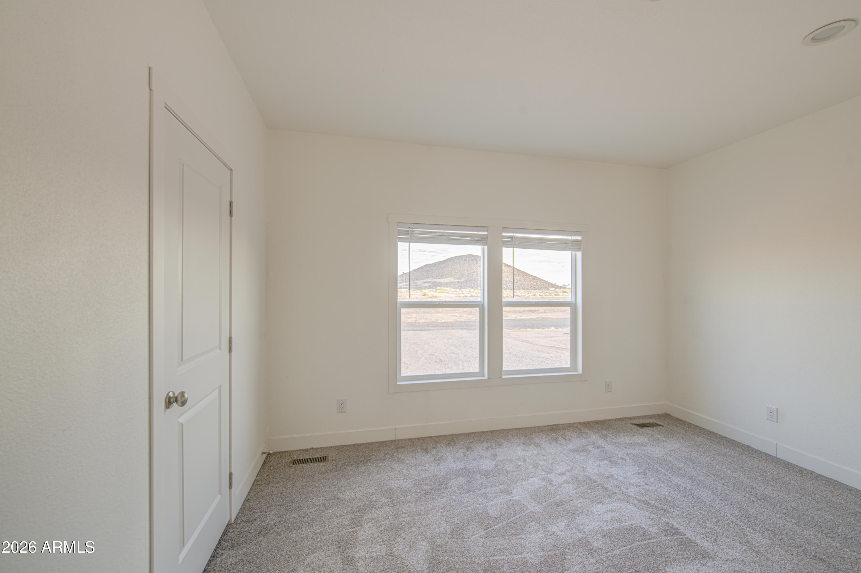 39112 West Maldonado Road Tonopah, AZ 85354 - Photo 15 of 34 an empty room with windows