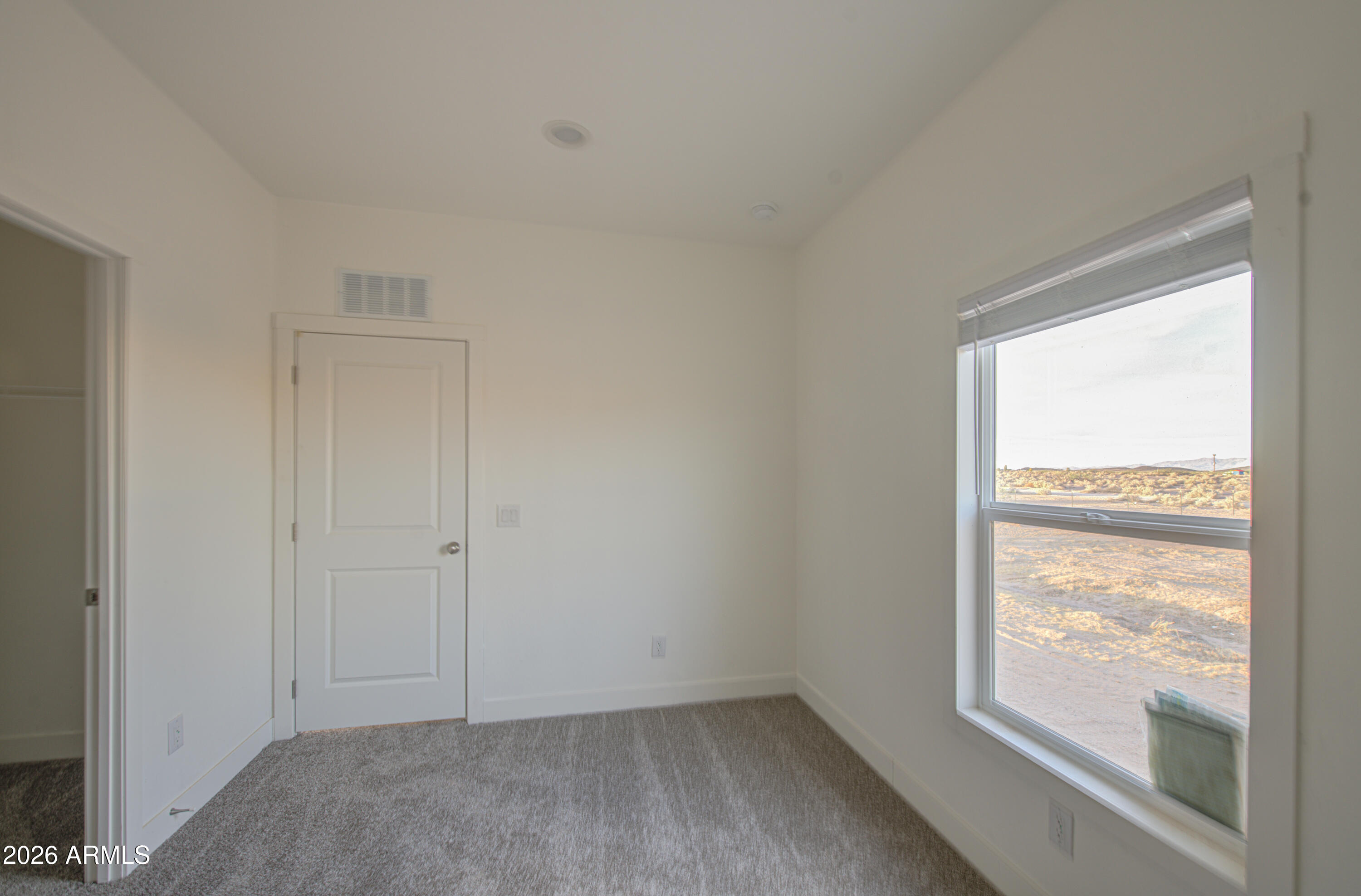 39112 West Maldonado Road Tonopah, AZ 85354 - Photo 27 of 34 a view of an empty room and window