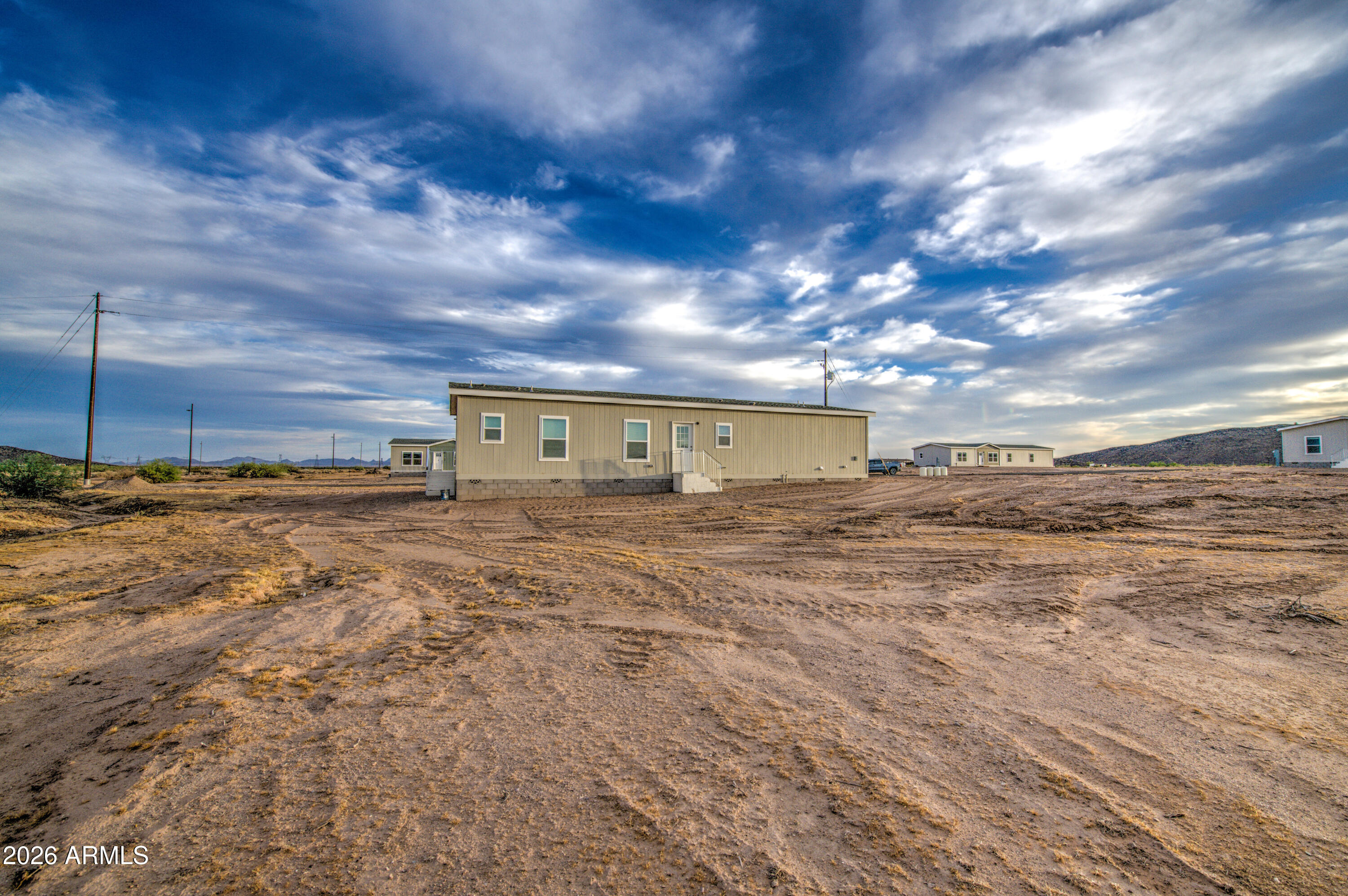 39112 West Maldonado Road Tonopah, AZ 85354 - Photo 32 of 34 a view of a big room with wooden fence