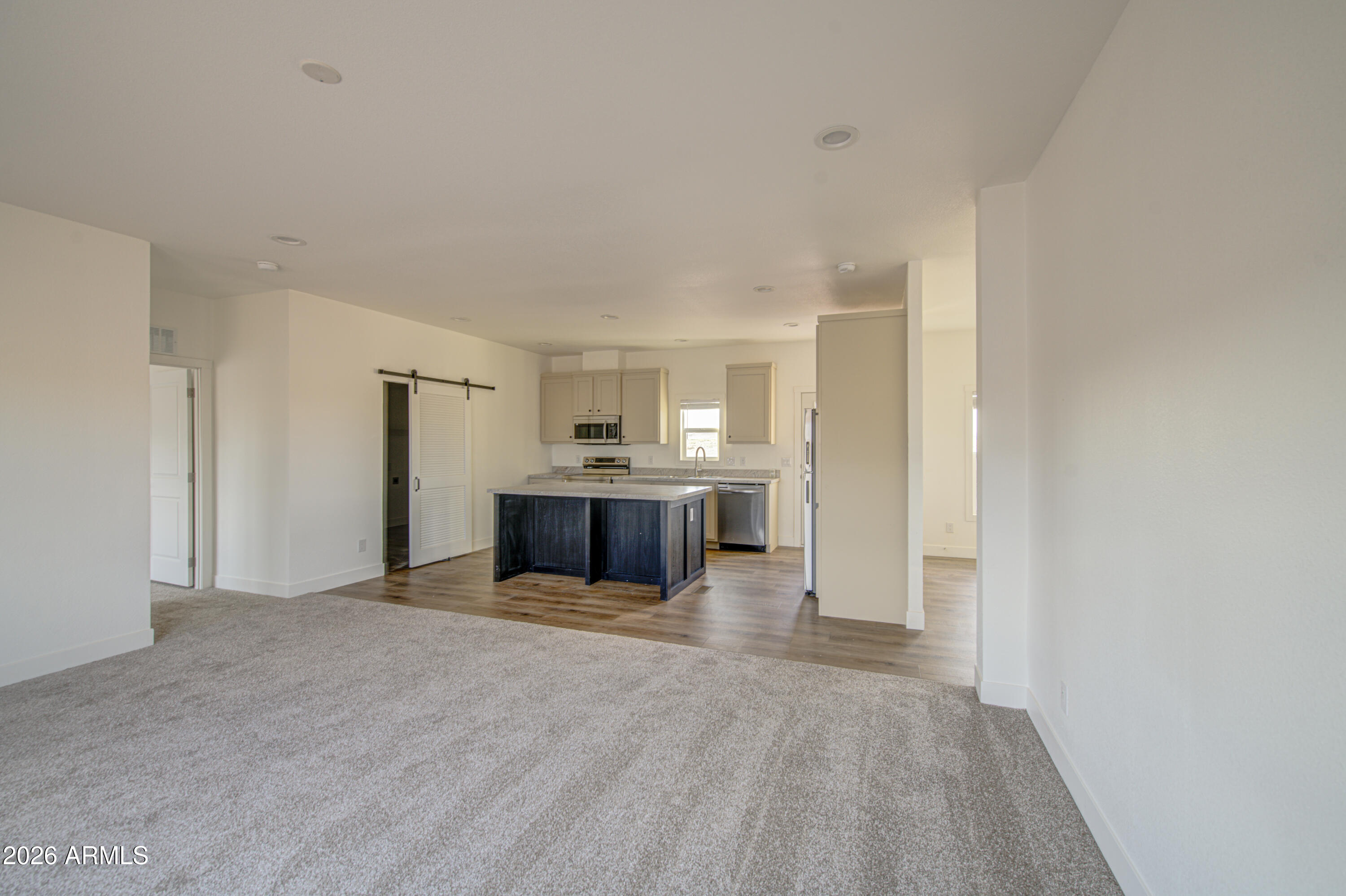 39112 West Maldonado Road Tonopah, AZ 85354 - Photo 6 of 34 a view of kitchen with a refrigerator and a sink
