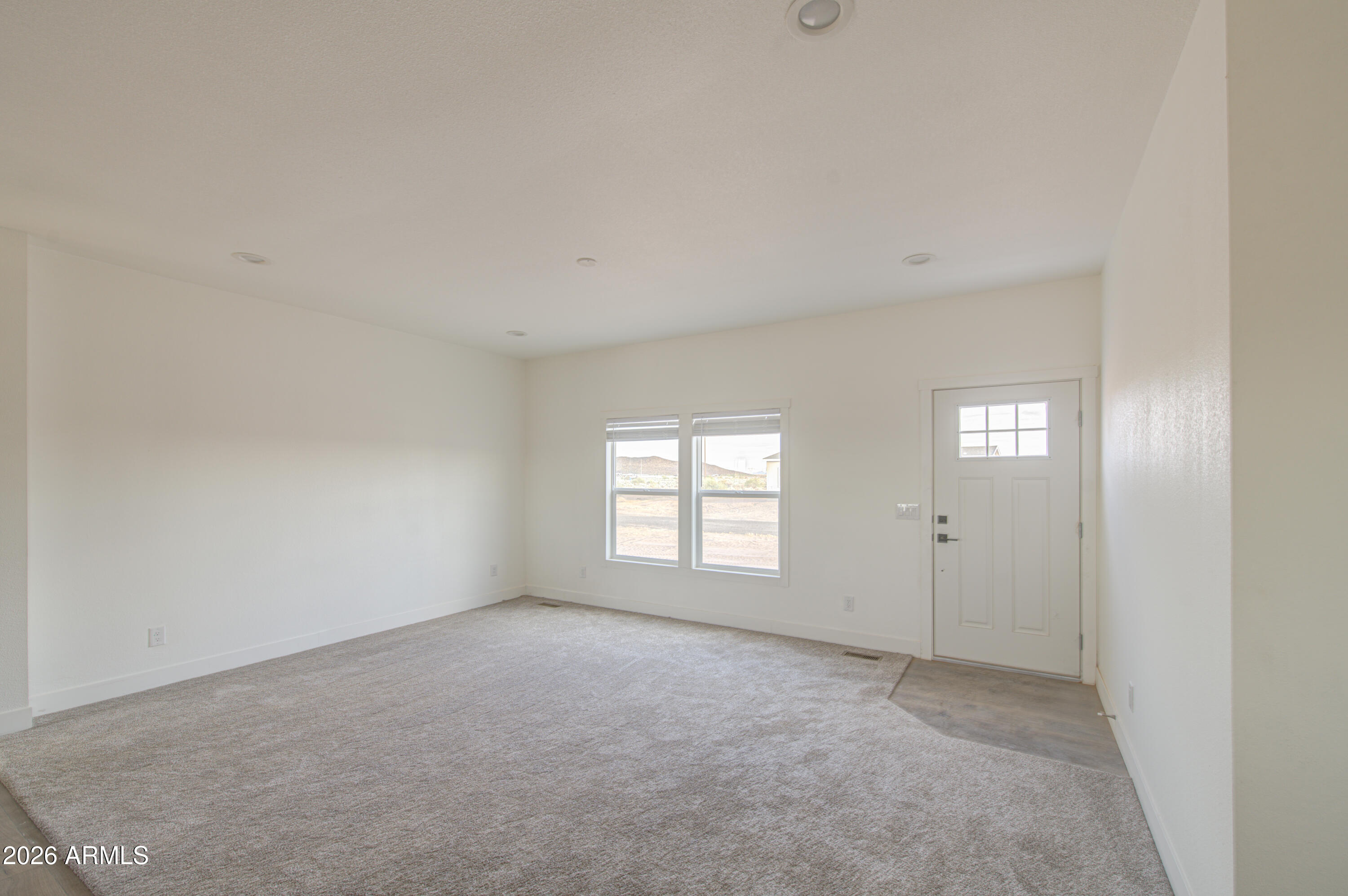 39112 West Maldonado Road Tonopah, AZ 85354 - Photo 7 of 34 a view of empty room with window