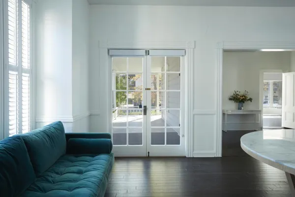 a living room with furniture and a window
