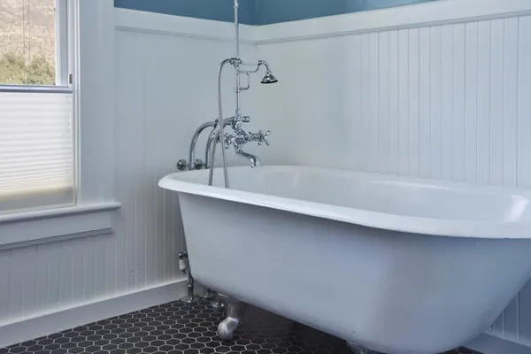 a bathroom with a sink and a shower