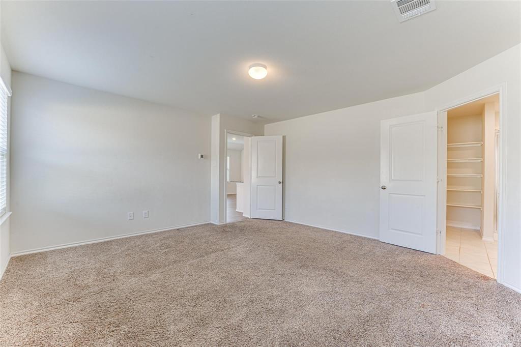 517 Milo Way Royse City, TX 75189 - Photo 9 of 34 Carpeted room featuring neutral wall tones and a window with blinds