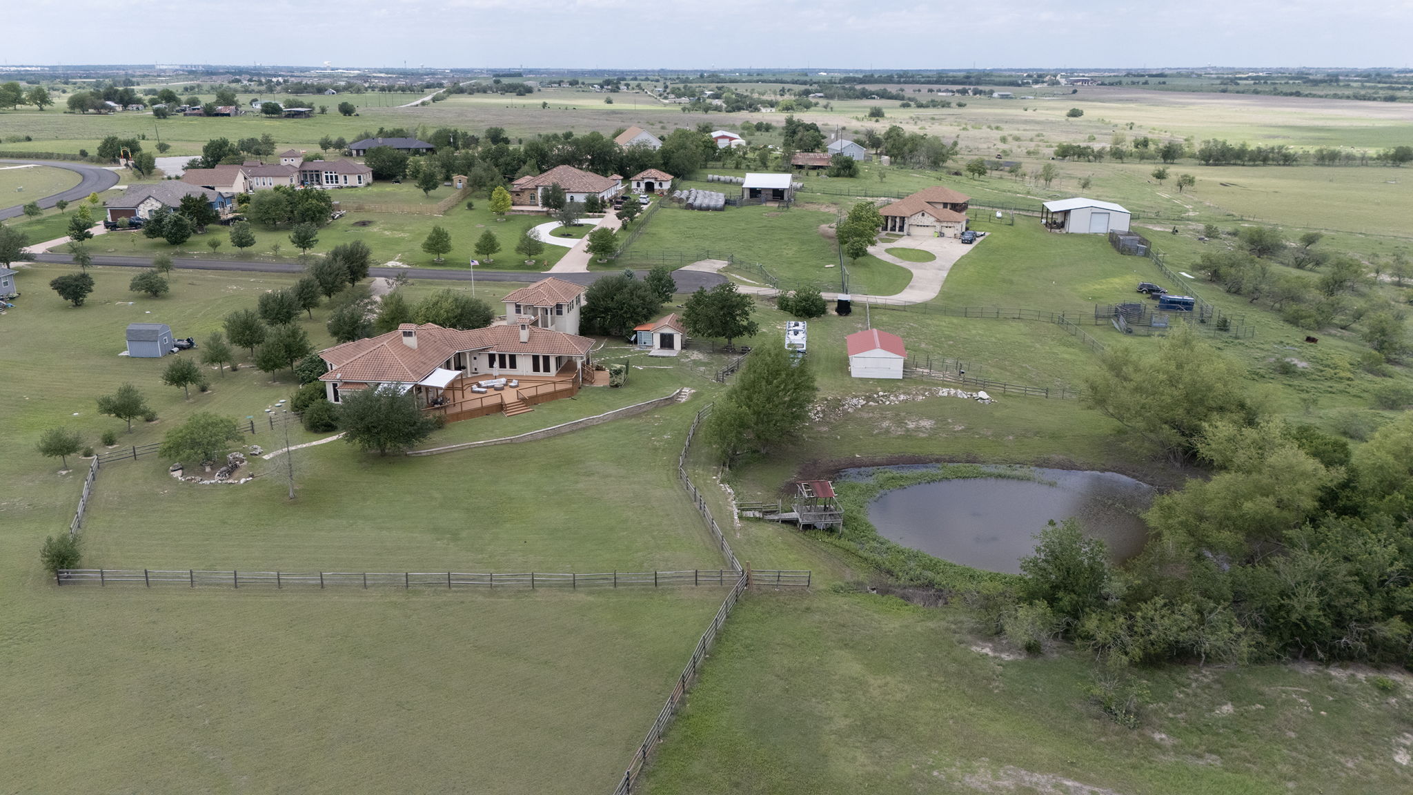 17308 St Therese Road Manor, TX 78653 - Photo 39 of 40 an aerial view of a house with a yard