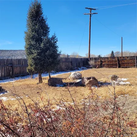 a view of a backyard of a house